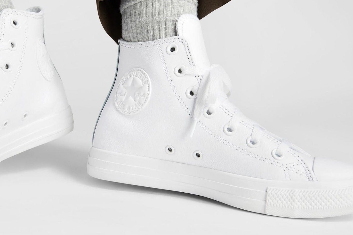 The Converse Chuck Taylor All Star Hi, one of the best white sneakers